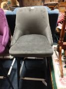 A MODERN UPHOLSTERED VELVET BAR STOOL