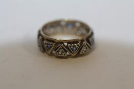 9CT GOLD & SILVER ETERNITY RING SET WITH BLUE & WHITE STONES