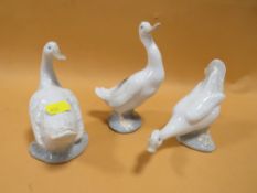THREE NAO DUCK FIGURES