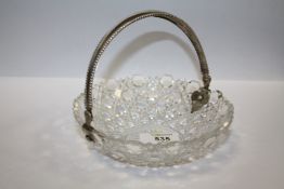 AN ANTIQUE CUT GLASS BOWL WITH DUTCH SILVER MOUNTS