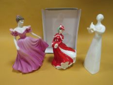 A BOXED ROYAL DOULTON FIGURE 'CHRISTMAS CELEBRATION', TOGETHER WITH A ROYAL DOULTON 'PEACE' FIGURE
