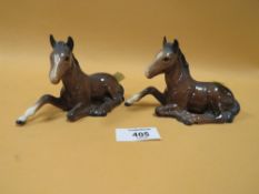 TWO BESWICK SEATED FOAL FIGURES