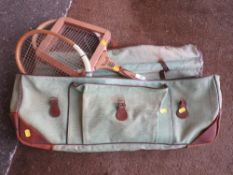 A VINTAGE CANVAS RACKET SATCHEL AND CONTENTS