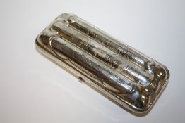 A THREE SECTION CIGAR CASE