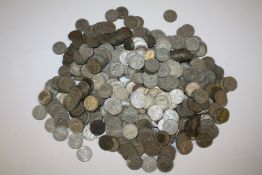 A LARGE QUANTITY OF SIX PENCE PIECES