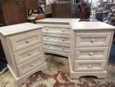 A MODERN LIMED OAK THREE DRAWER CHEST AND PAIR OF BEDSIDE CHESTS (3)