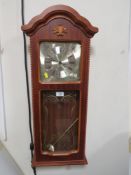 A MODERN REPRODUCTION MAHOGANY WALL CLOCK BY 'ABBEY'