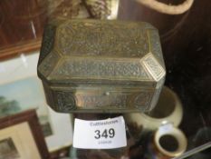AN ANTIQUE EASTERN BRASS LIDDED TRINKET BOX