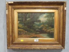 A GILT FRAMED ANTIQUE OIL ON CANVAS DEPICTING A WOODLAND BROOK SCENE,SIGNED LOWER RIGHT