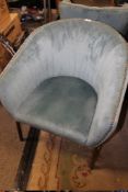 A MODERN UPHOLSTERED TUB CHAIR