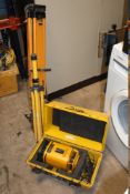 A CASED LASER ALIGNMENT LASER BEACON PLUS TWO TRIPODS