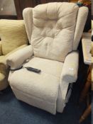 AN ELECTRIC RISE/RECLINE ARMCHAIR