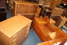 A RETRO TEAK DRESSING TABLE, SIDE CABINET AND SCHREIBER CHEST OF DRAWERS (3)