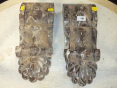 A PAIR OF MARBLE TYPE CORBELS