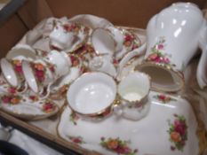 A TRAY OF ROYAL ALBERT OLD COUNTRY ROSES CHINA TO INCLUDE A COFFEE POT, CUPS AND SAUCERS ETC.