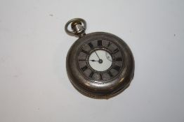 AN ANTIQUE SILVER CASED WALTHAM ROYAL HALF HUNTER POCKET WATCH