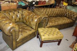 A GREEN LEATHER CHESTERFIELD TOGETHER WITH ARMCHAIR & FOOTSTOOL