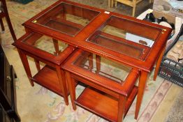 A MODERN SET OF THREE, NEST OF TABLES