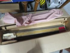 A BOXED VINTAGE KNITMASTER KNITTING MACHINE