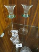 A WATERFORD CRYSTAL TEDDY BEAR FIGURE, TOGETHER WITH A PAIR OF VINTAGE CANDLESTICKS (3)