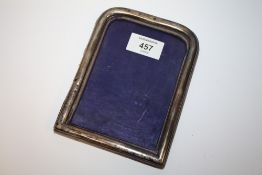 A VICTORIAN ARCHED PICTURE FRAME