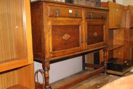 A VINTAGE OAK SIDEBOARD