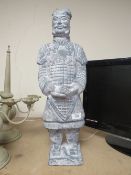A LARGE FIGURE OF AN ORIENTAL WARRIOR