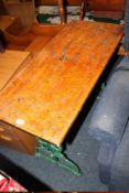 A VINTAGE CAST BASE PUB STYLE TABLE WITH VARIOUS GRAFFITI STYLE TOP W-97 CM