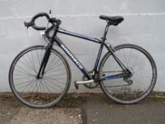 A GENTS AMMACO 14 SPEED RACING BIKE. painted black having a 19