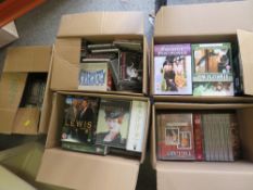 A LARGE QUANTITY OF DVDS AND CDS ETC.