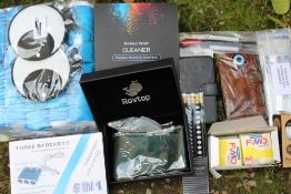 A MIXED CAGE TO INCLUDE NECK TIES, SUNDRIES, ELECTRICALS, PHONE CASES ETC A/F