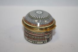 A HALCYON DAYS ENAMEL PILL BOX IN THE FORM OF THE ROYAL ALBERT HALL