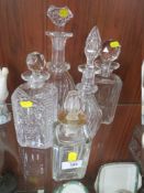 A COLLECTION OF VINTAGE CUT GLASS DECANTERS (5)