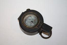 A WWII FIELD / MARCHING COMPASS