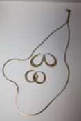 A PAIR OF 9 CARAT GOLD HOOP EARRINGS TOGETHER WITH TWO OTHERS AND YELLOW METAL CHAIN