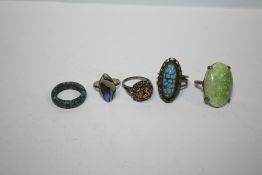 A BAG OF SILVER AND WHITE METAL DRESS RINGS