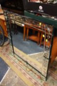 A MODERN ENGRAVED WALL MIRROR 93 X 93 CM