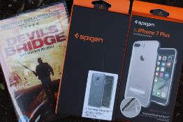 A CAGE OF MOSTLY DVDS, PHONE CASES AND BOOKS ETC