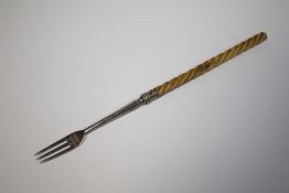 AN ANTIQUE HALLMARKED SILVER PICKLE FORK