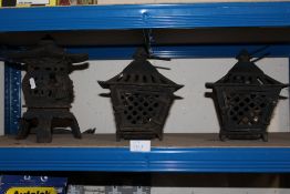 THREE SMALL CAST LANTERNS / BURNERS
