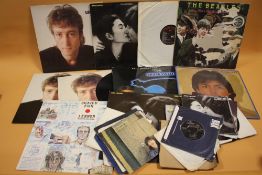 A COLLECTION OF THE BEATLES AND RELATED LP RECORDS AND SINGLES