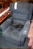 A BLUE UPHOLSTERED RISE / RECLINE ARMCHAIR