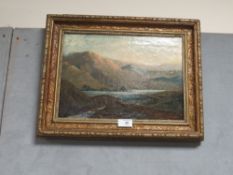A GILT FRAMED OIL ON CANVAS DEPICTING A MOUNTAINOUS RIVER SCENE