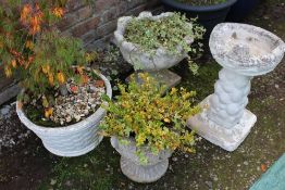 A BASKET EFFECT GARDEN PLANTER TOGETHER WITH TWO OTHER PLUS A BIRD BATH (4)