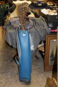 A GOLFING BAG PLUS CLUBS AND VINTAGE LACROSSE STICKS