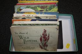 A QUANTITY OF VINTAGE CIGARETTE CARD ALBUMS