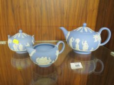 A WEDGWOOD BLUE JASPERWARE THREE PIECE TEA SERVICE