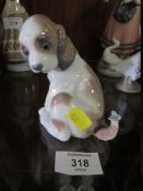 A LLADRO FIGURE OF A PUPPY WITH A BUTTERFLY ON ITS TAIL