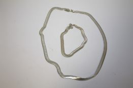 A HERRINGBONE STYLE 925 SILVER NECKLACE AND BRACELET SET
