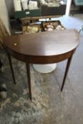 AN ANTIQUE DEMI-LUNE TABLE W - 90 CM